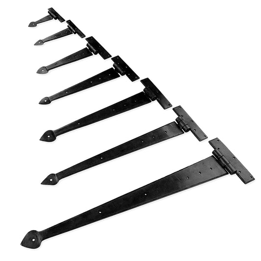 Set of black metal hinges on a white background