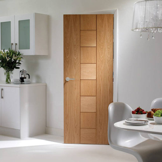Wooden door in a modern kitchen and dining area