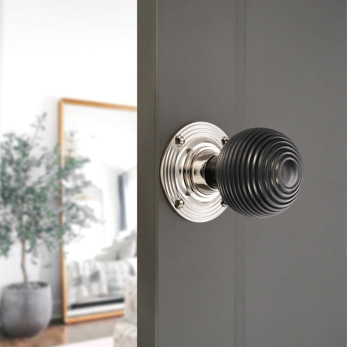 Ebony Beehive Rim/Mortice Door Knob Polished Nickel