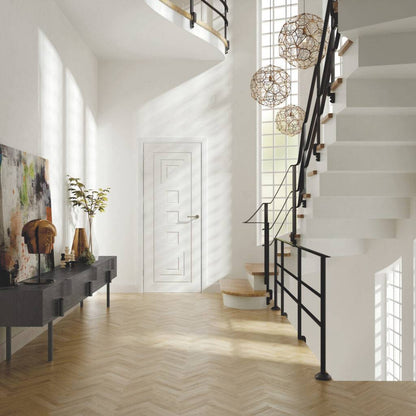 Modern interior with a staircase, white walls, and decorative elements.