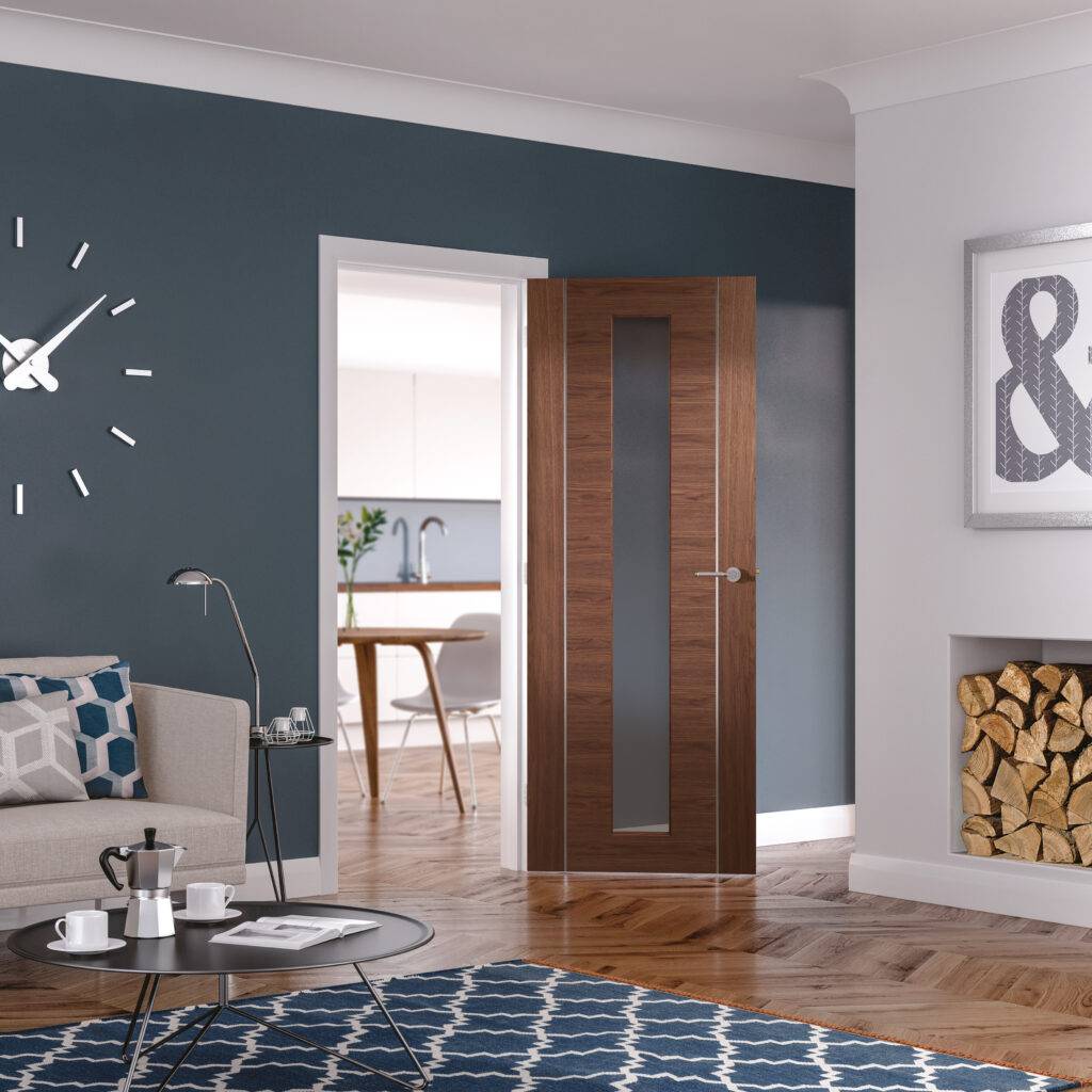 Modern living room with a wooden door, sofa, and coffee table.